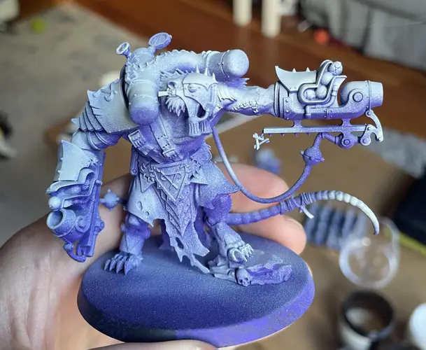 A primed Skaven Stormfiend, with dark violet from below and warm white from above.