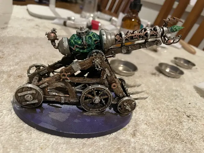 A Skaven Warp Lightning Cannon painted with oils. The paint is still glossy and wet. The metallic elements here will need some burnt umber to make them look less "clean".